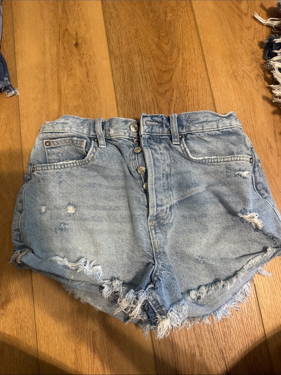 Free People Pants - Free PeopleHigh-Rise Distressed Denim Shorts - Light Blue